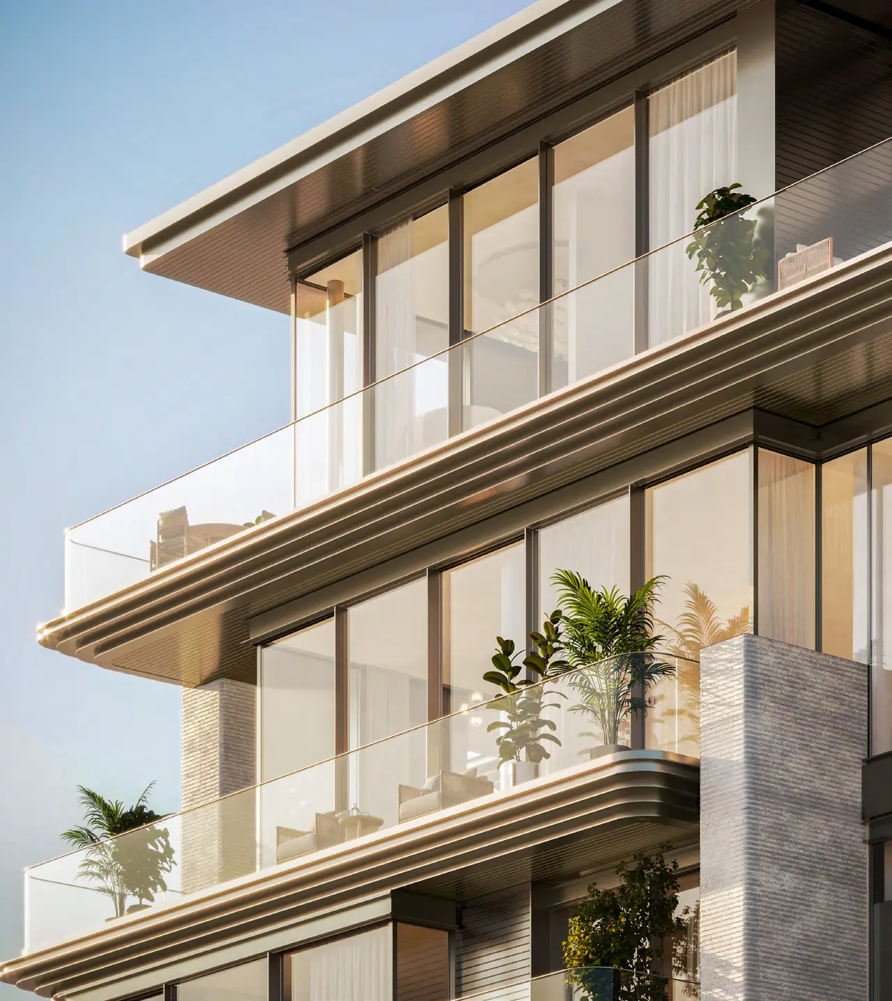 Solaya façade with deep sea-facing terraces and glass balustrades
